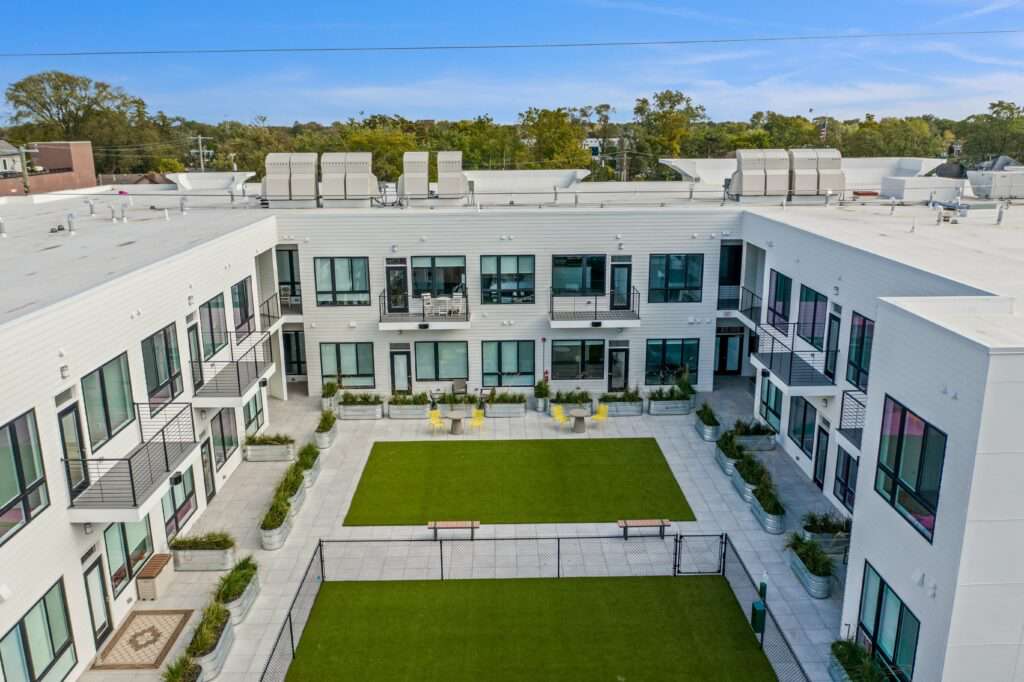 Outdoor Courtyard With View of Units at The Roy Apartments.